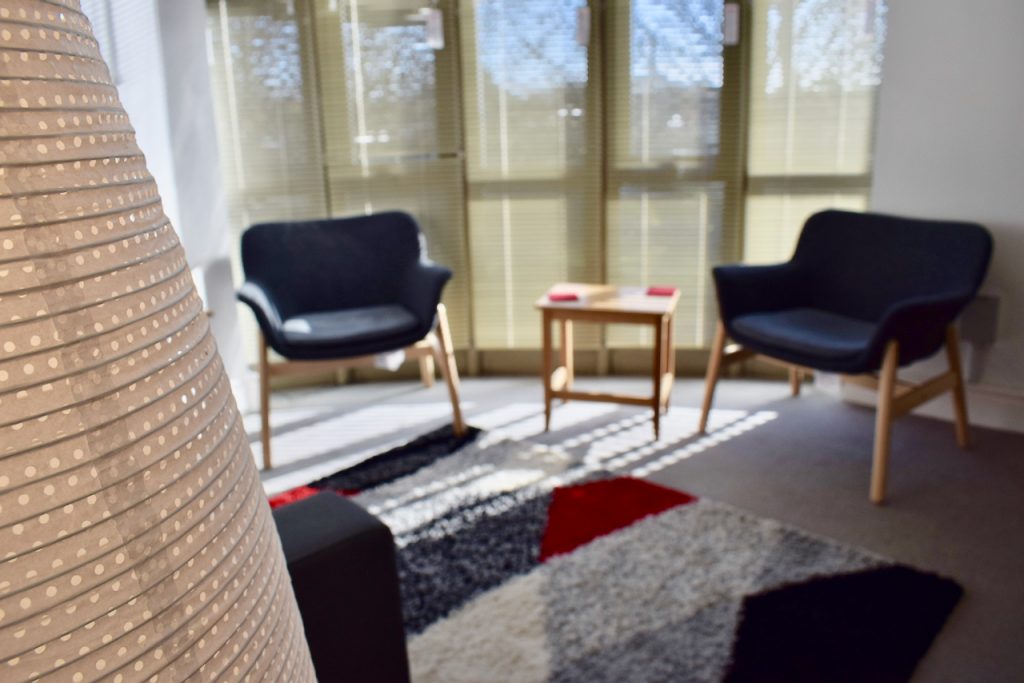 Photograph of chairs set up for bookings in Room 2